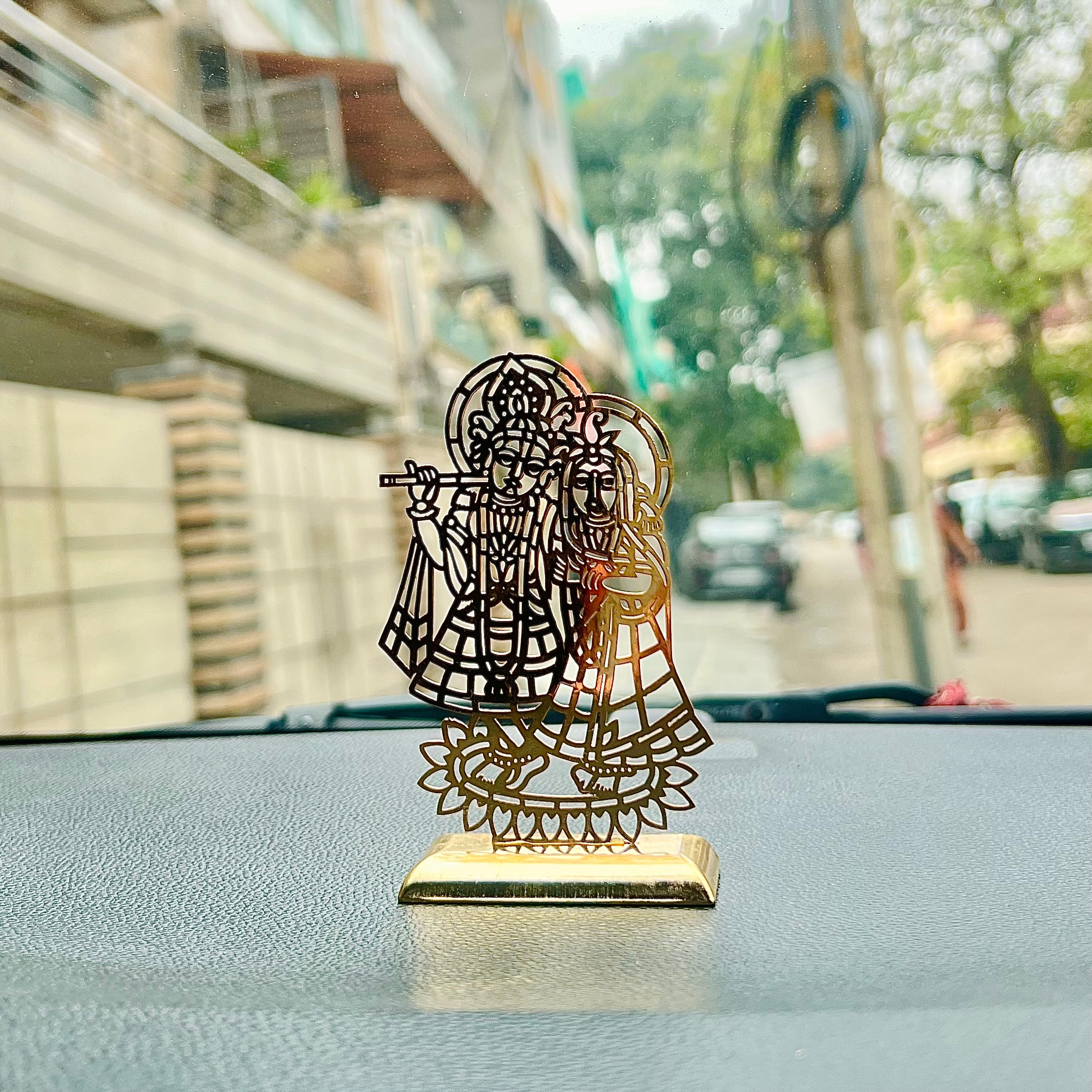 Radha krishnaA beautifully crafted accessory, perfect for adding blessings and grace to your car's dashboard, serving as a decorative centerpiece on your table, or even adding chHindustanwaleRadha krishna