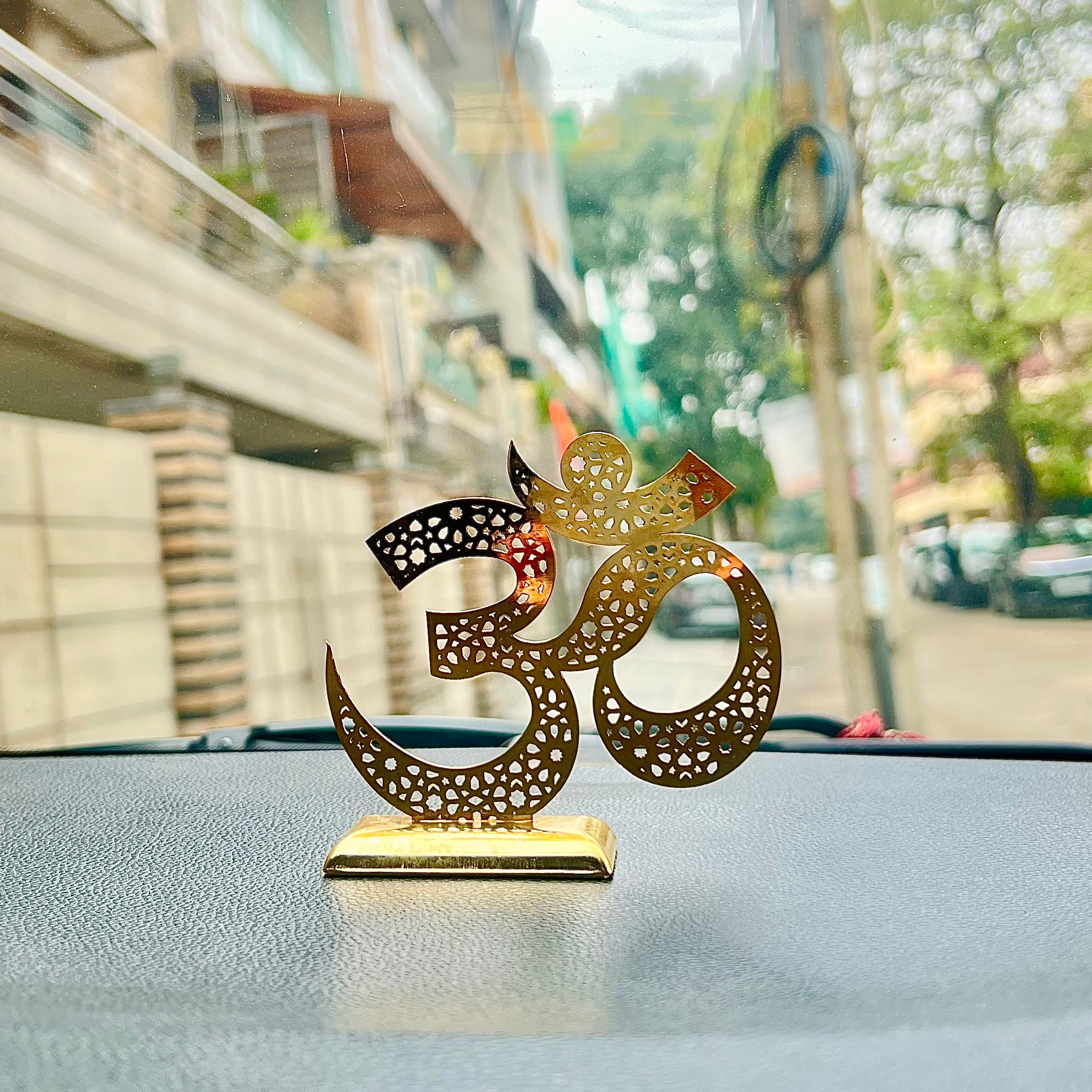 OM echoA beautifully crafted accessory, perfect for adding blessings and grace to your car's dashboard, serving as a decorative centerpiece on your table, or even adding chHindustanwaleOM echo